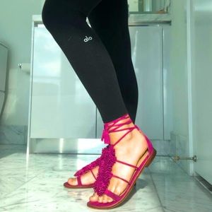 Halogen pink leather flat sandals with ankle tie straps tassels and fringe